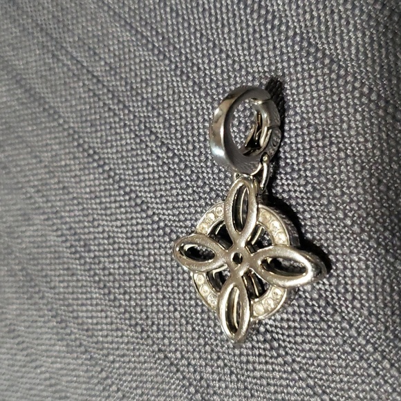FOSSIL flower silvertone steel charm or pendant - Picture 2 of 3